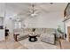 Cozy living room features a sectional sofa and neutral color palette at 2220 Lily Valley Dr, Lawrenceville, GA 30045