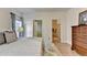This bedroom features a decorative rug, access to a closet, and access to a bathroom at 2220 Lily Valley Dr, Lawrenceville, GA 30045