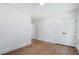 Bright bedroom with hardwood floors, white walls, and closet at 2249 Beecher Sw Rd, Atlanta, GA 30311