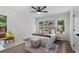 Bright bedroom with a white color scheme and hardwood floors at 2249 Beecher Sw Rd, Atlanta, GA 30311