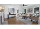 Inviting living room featuring hardwood floors, neutral decor, and ample natural light at 2249 Beecher Sw Rd, Atlanta, GA 30311