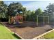 Community playground with swings and climbing structure for outdoor fun at 4275 Hunters Walk Way, Cumming, GA 30028