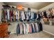 Spacious walk-in closet with ample shelving and organized storage at 4275 Hunters Walk Way, Cumming, GA 30028