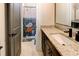 Charming bathroom with granite countertops, modern sink and vanity, and fun ocean themed shower curtain at 2900 Waterford Dr Sw, Conyers, GA 30094