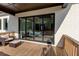 A covered patio with a wall of glass and outdoor seating, perfect for entertaining at 2900 Waterford Dr Sw, Conyers, GA 30094