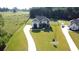 Stunning two-story home with modern architecture, a long driveway, and large front yard at 2900 Waterford Dr Sw, Conyers, GA 30094