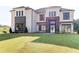 Beautifully landscaped front yard featuring a modern two story home with stone and brick accents at 2900 Waterford Dr Sw, Conyers, GA 30094