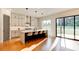 Modern kitchen with island seating, quartz countertops and stainless steel appliances at 2900 Waterford Dr Sw, Conyers, GA 30094
