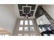High ceiling living room with fan, fireplace and large windows for natural light at 2900 Waterford Dr Sw, Conyers, GA 30094