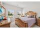 Bright bedroom with large windows, offering natural light and a comfortable living space with serene views at 35 Henson Farm Dr, Loganville, GA 30052