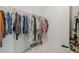 Spacious walk-in closet with ample hanging space and shelving for organized storage, providing convenience and functionality at 35 Henson Farm Dr, Loganville, GA 30052