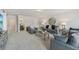 Spacious living room with stylish decor, offering a comfortable and inviting atmosphere for gatherings at 35 Henson Farm Dr, Loganville, GA 30052