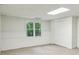 Finished basement with a window view and closet storage; ideal for a flexible living space at 5195 Overbend Trl, Suwanee, GA 30024