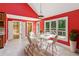 Cozy breakfast nook with a large window that showcases the outside greenery, and dining area at 5195 Overbend Trl, Suwanee, GA 30024