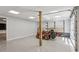 Well-lit garage, great for parking or projects, with shelving and a lawnmower at 5195 Overbend Trl, Suwanee, GA 30024