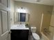 Bathroom features single vanity with a white marble top and decorative plant at 110 Stagecoach Trl, Stockbridge, GA 30281
