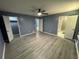Large main bedroom features vinyl flooring and multiple doors at 110 Stagecoach Trl, Stockbridge, GA 30281