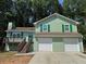 Charming two-story home with a two-car garage and a deck at 110 Stagecoach Trl, Stockbridge, GA 30281