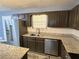 Close up of updated kitchen with modern countertops and stainless steel appliances at 110 Stagecoach Trl, Stockbridge, GA 30281