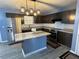 Modern kitchen features stainless steel appliances and ample countertop space at 110 Stagecoach Trl, Stockbridge, GA 30281