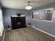 Living room features a stunning black marble fireplace at 110 Stagecoach Trl, Stockbridge, GA 30281