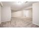 Spacious basement with neutral carpet, fresh paint, and a view of closet at 4442 Cedar Ridge Trl, Stone Mountain, GA 30083