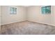 Comfortable bedroom with neutral carpet, and windows allowing for natural light at 4442 Cedar Ridge Trl, Stone Mountain, GA 30083