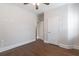 Bedroom with hardwood floors and a neutral color palette, creating a serene atmosphere at 601 Cork St, Woodstock, GA 30188