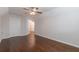 Bonus room featuring hardwood floors and a ceiling fan, offering flexible living space at 601 Cork St, Woodstock, GA 30188