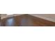 Close-up of beautiful hardwood flooring, showcasing the rich tones and smooth finish throughout the home at 601 Cork St, Woodstock, GA 30188