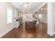 Well-lit kitchen with modern appliances, island, and stylish finishes; great layout for cooking and entertaining at 601 Cork St, Woodstock, GA 30188