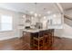 Kitchen with island, stainless steel appliances, granite counter tops and lots of cabinets at 601 Cork St, Woodstock, GA 30188
