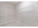 Spacious walk-in closet featuring wire shelving for ample storage and organization at 601 Cork St, Woodstock, GA 30188