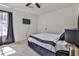Modern bedroom featuring neutral tones, stylish decor, and a comfortable bed at 3915 Basil Sw Way, Atlanta, GA 30331