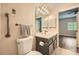 Updated bathroom features new vanity, modern fixtures, decorative tile flooring and an adjacent bedroom at 1800 Clairmont Lk # A310, Decatur, GA 30033