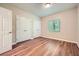 Bedroom with wood-look floors, natural light from window, and double closets for ample storage at 1800 Clairmont Lk # A310, Decatur, GA 30033