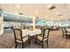 Spacious dining area with multiple tables, neutral carpeting, and great window views at 1800 Clairmont Lk # A310, Decatur, GA 30033