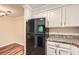 Kitchen featuring a modern refrigerator and stylish countertops at 1800 Clairmont Lk # A310, Decatur, GA 30033
