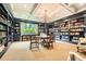 Library with floor to ceiling bookshelves, coffered ceilings and a central reading table at 1800 Clairmont Lk # A310, Decatur, GA 30033