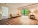 Bright living room with hardwood floors, large windows, and neutral paint at 1800 Clairmont Lk # A310, Decatur, GA 30033