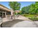Outdoor patio area featuring ample seating under umbrellas, perfect for dining and relaxation at 1800 Clairmont Lk # A310, Decatur, GA 30033