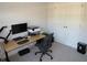 This home office features a work station and storage closet at 3411 Swallowtail Ter, Duluth, GA 30096