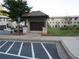 Community mailboxes for townhomes, featuring brick construction and landscaping at 3411 Swallowtail Ter, Duluth, GA 30096