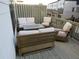 Relaxing outdoor deck space with comfortable seating arrangement and a privacy fence at 3411 Swallowtail Ter, Duluth, GA 30096
