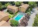 Aerial view featuring building with a swimming pool and lush green trees at 3510 Roswell Nw Rd # N3, Atlanta, GA 30305