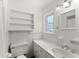 Bright bathroom with lots of storage and a window at 3510 Roswell Nw Rd # N3, Atlanta, GA 30305