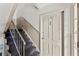Upstairs entrance with door number 3, with neutral-toned walls and carpeted stairs at 3510 Roswell Nw Rd # N3, Atlanta, GA 30305