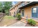 Apartment building featuring brick exterior, stairs to upper units, and well-maintained landscaping at 3510 Roswell Nw Rd # N3, Atlanta, GA 30305