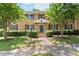 Apartment building with a manicured lawn, sidewalk, and mature trees in a garden-like setting at 3510 Roswell Nw Rd # N3, Atlanta, GA 30305