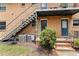 Apartment building features brick exterior, stairs to upper units, and a green yard at 3510 Roswell Nw Rd # N3, Atlanta, GA 30305